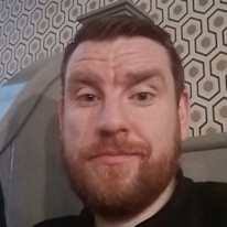 With cat housemates in Larne, Northern Ireland