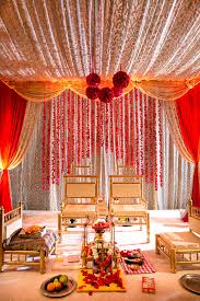 We have great 2020 wedding decorations on sale. An Ornate Red And Gold Traditional Indian Mandap Indian Wedding Decorations Traditional Indian Wedding Wedding Mandap