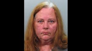 Woman accused of exploiting 73-year-old father