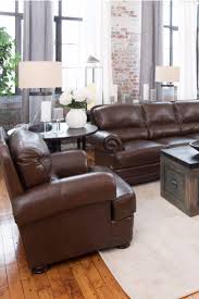 Place the accent chair at an angle so it faces toward the coffee table. How To Arrange Furniture In A Square Living Room Overstock Com