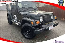 Image result for Brilliant Black 2002 Jeep