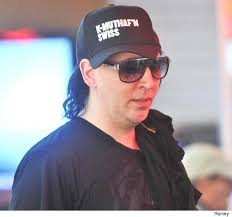 Oh, Brian Hugh Warner, you cad! Now that Mr. Marilyn Manson doesn&#39;t have his on-again-off-again engagement with the lovely and talented (and nearly half his ... - marilyn-manson-kenny-powers