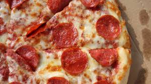 Medium pizzas run 12 inches in diameter and will give you about eight slices. Find Out The Pizza Size That Offers The Best Value
