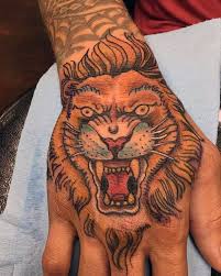 Various cultures see a lion tattoo as a symbolism of a person's strength, bravery, and power while others see it as a symbol of justice, authority, and protection. 30 Traditional Lion Tattoo Designs For Men Retro Big Cat Ideas