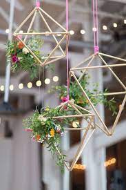 A hanging diy flower wall is an elegant decor feature that's simple to make and perfect for incorporating fresh flowers. Diy How To Make Your Own Wedding Decor From A Primark Hanger