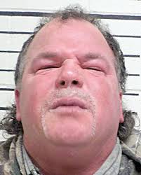 Tahlequah man accused of ramming woman's van while she was asleep inside