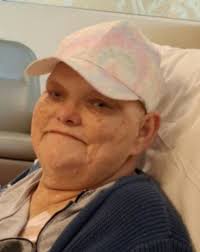 Joyce E. Moore, 63, of Pana passed away Friday, May 23, 2025 in Springfield  Memorial Hospital. She was born December 7, 1961 in Mendota, CA to the late  Bill and Carolee (Barker)