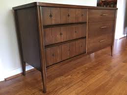 We are happy to work around your schedule but be aware that this could result in a delay in receiving your order. Mid Century Modern Walnut Broyhill Saga Lowboy Dresser Epoch