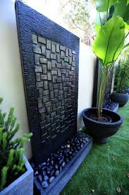 A water wall (also called a bubble wall) is a different sort of backyard water feature. 22 Unique Diy Fountain Ideas To Spruce Up Your Backyard Garden Wall Decor Garden Design Images Garden Wall