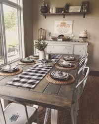 Traditional Farmhouse Dining Room With Checked Textiles And Wooden Table Plus Metal Chair Farm House Living Room Farmhouse Style Dining Room Dining Room Design