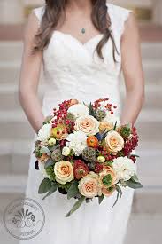 If you're a bride with a penchant for whimsy, a floral wedding dress may be the perfect gown for you. Peach And Red Wedding Bouquet