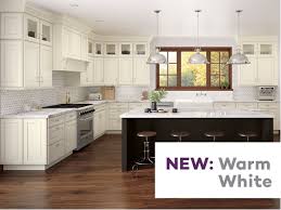 The modern and sharp look is minimized with the warm color of wood as a backsplash! à¦Ÿ à¦‡à¦Ÿ à¦° Kraftmaid Cabinetry White Is Hot Which Is Why We Ve Added Warm White To Our Paint Collection This Creamier Version Of Tried And True White Is An Ideal Match To The Spicy Reds Chocolaty