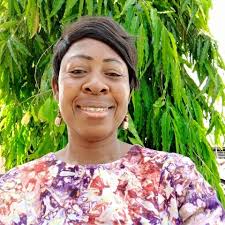 The symbolism in this photo is striking. Senyeuidzorm Adadevoh takes photos  at the launch of a report