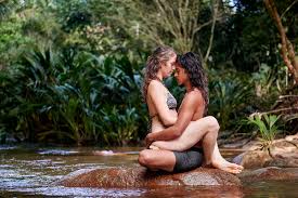 Подборка книг на тему тантра. Couple Practicing Tantra Yoga In The River By Jose Coello Nature Tantra Stocksy United
