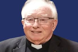 Fr. John Downey remembered as 'normal, long-distance running electrician'  who following late vocation ministered to dying at Greysteel