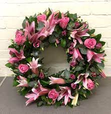 Funeral floral arrangements in london. Pink Lily Funeral Wreath Essex Florists Blossom Florists For Funeral Wreaths