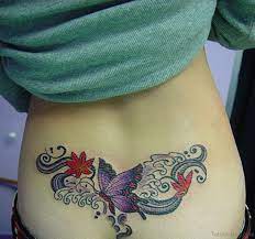 Colored Butterfly Tattoo On Lower Back Lower Back Tattoos Back Tattoos Tattoos For Women