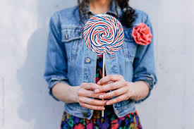Female Person Holding A Lollipop By Marija Kovac For Stocksy United Color Wars Stock Photography Free Lollipop Girl