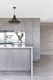 The glass, mullion doors keep the cabinetry. 14 Best Grey Kitchen Cabinets Design Ideas With Grey Cabinets