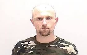 Cops: Man bites another inmate's ear off during fight