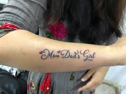 Wrist tattoos are extremely elegant and feminine, allowing girls to subtly express themselves with delicate body art. Font Mom And Dad Tattoo Designs For Wrists