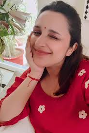Parineeti Chopra, who's reportedly expecting her first child with husband  Raghav Chadha, radiated warmth and serenity in her recent Navratri post.  Dressed in a simple red kurta and no-makeup look, the actress