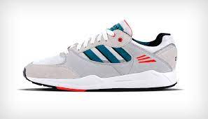 It's latest incarnation features suede and mesh uppers in gold, black with hints of grey and red, a. Adidas Tech Super