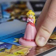 Comprar juegos de mesa online. Munecos Monopoly Mario Kart Off 63