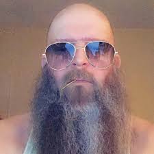 What is the name of the little white house eyecare place in O'Fallon