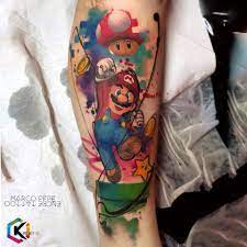 17 stunning watercolor tattoos you have to see to believe. Tatuaggio Supermario Watercolor Marco Pepe Tattoo Facebook
