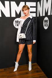 We interrupt whatever you're doing right now with a very important update: Taylor Swift Leads Arrivals On Nme Awards Red Carpet As Sinitta Dresses As A Spaceman Mirror Online