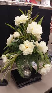 Situated in a glass vase, this realistic artificial poinsettia arrangement can add a. Designed By Christine Lucas Crowley Flower Arrangements Floral Arrangements Silk Floral Arrangements