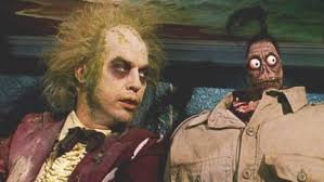 The camera whips around weirdly and he's there. The Untold Truth Of Beetlejuice