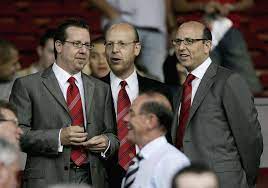 Manchester united fans hold flares as they protest outside of old trafford, during a protest against the glazer family, owners of manchester united, before their match. What Is Manchester United S Ownership Situation And How Would Kevin Glazer S Sale Of Shares Affect The Club Goal Com