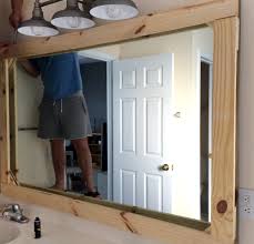 Measure mirror and select frame style. How To Frame A Mirror With Wood Tag Tibby Design
