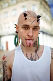 A common ground for those of us that share the. Oh Jeez This Style Suits Him Very Well Body Mods Bald Head Tattoo Body Piercings