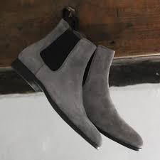 The style was originally derived from riding boots so they were also known as 'paddock boots'. Grey Suede Chelsea Boot Made In Italy 280 Grey Chelsea Boots Men Chelsea Boots Outfit Chelsea Boots