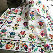 They say the earth laughs in flowers. Flower Garden Quilt Kim Mcclean Pattern Laila Nelson Applique Quilting Applique Quilt Patterns Floral Quilt