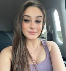 Can someone create a professional headshot with a smile?