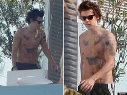 Harry Styles Snapped Shirtless Holding Baby Lux With His Many Tattoos On Display Pictures Huffpost Uk