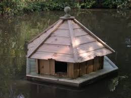 Buttercup Hexagonal Floating Duck House Medium Waterfowl Nesting Box For Pond Or Lake Duck pond cottage is located in crosshill.