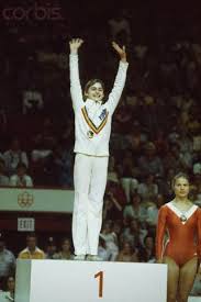 At the same games (1976 summer olympics in montreal), she received six more perfect 10s for events en route to winning three gold medals. Nadia Comaneci Makes History With Her Perfect 10 Performance In Montreal Nadia Comaneci Olympic Games Nadia Comaneci Perfect 10