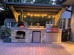 Best home pizza ovens from brands like breville, presto, ooni, and roccbox to use indoors, outdoors, or on the countertop for perfect pies at home. Outdoor Kitchen With Wood Fired Oven Outdoor Kitchen Plans Outdoor Kitchen Design Outdoor Kitchen Patio