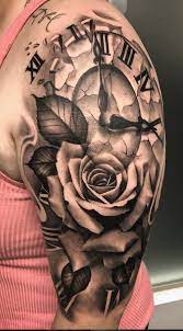 Black and grey flying owl with clock tattoo on man chest. A Cracked Clocked With Rose Displayed In A Black Grey Realistic Tattoo Tattoos Tattooart Tattooer Clock And Rose Tattoo Rose Tattoos Rose Tattoo Design