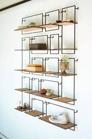 I used a painting technique that resulted in a black base color with pink and blue highlights that look distressed over the. Unique Wall Shelves 14 Wood Metal Wall Shelf Arrangement