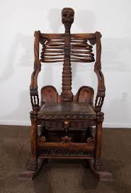 An Antique Hand Carved Skeleton Rocking Chair Rocking Chair Chair Hand Carved Skeleton band wake me up. an antique hand carved skeleton rocking