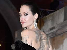 Angelina jolie's tattoo meanings are vast and varied. Nearly All Of Angelina Jolie S Tattoos Are Visible In Her New Guerlain Perfume Ad Allure