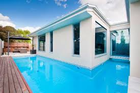 L Shape Pool Wraps Around The Home In Lake Wendouree Designed And Built By Albatross Pools Beautiful Pools Swimming Pool Designs Backyard Pool