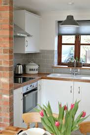 Laminate compact laminate solid wood maia metis minerva edging & joints. Kitchen With White Metro Tiles Novocom Top