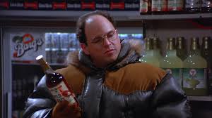 Jerry and elaine stop at a bakery to get a cake, but they forget to take a number and lose the chocolate pastry and the one they get has a hair on it. Wild Turkey Bourbon Bottle Held By Jason Alexander As George Costanza In Seinfeld Season 5 Episode 13 The Dinner Party 1994